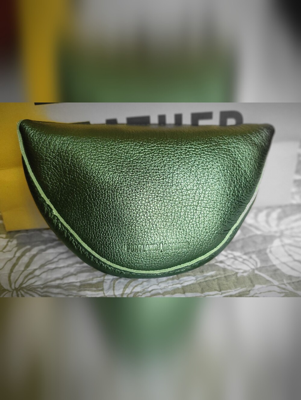 Portland Leather Small Koala Sling Bag in Metallic Greench.